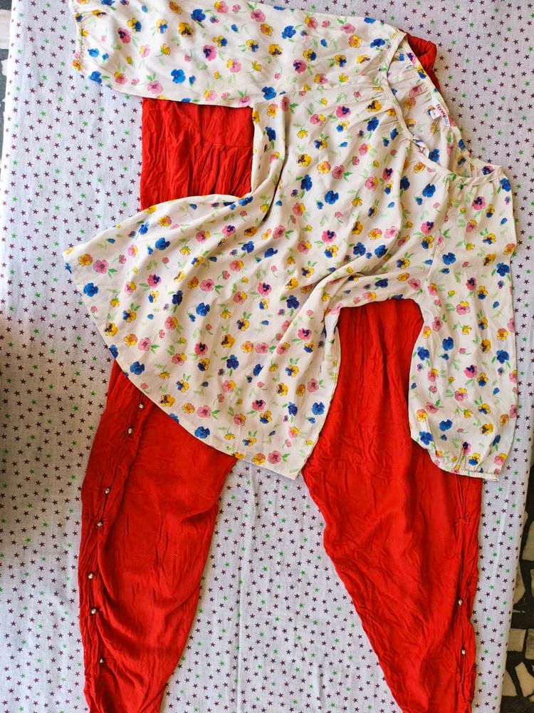 Floral top with Red Dhoti Pants