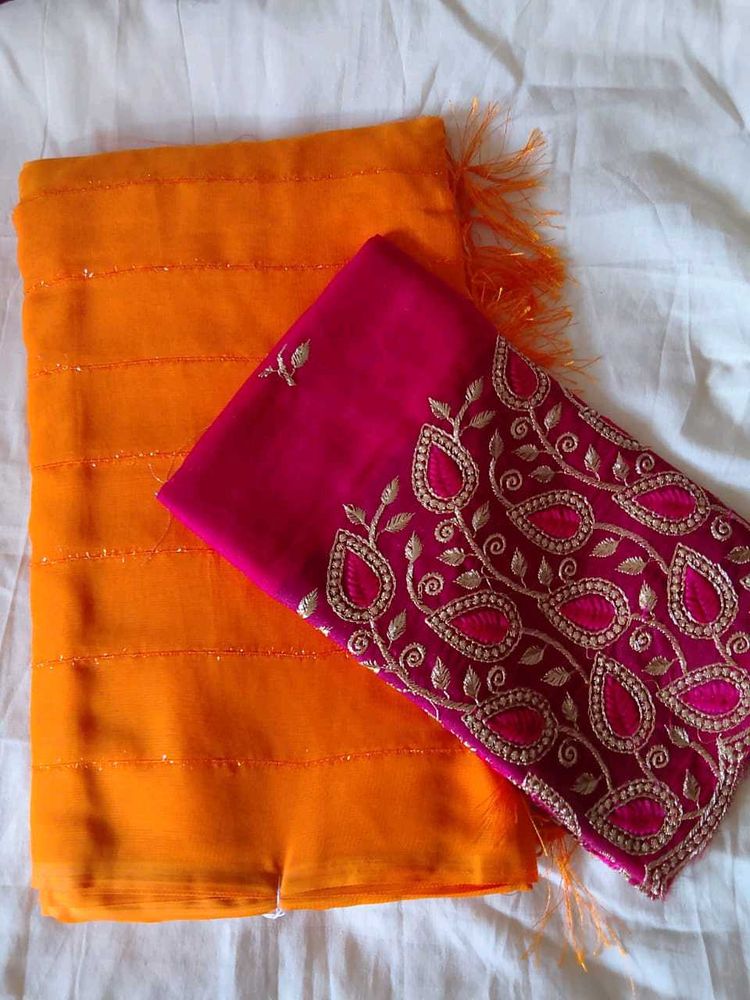Vibrant Orange Saree with Embellished Blouse