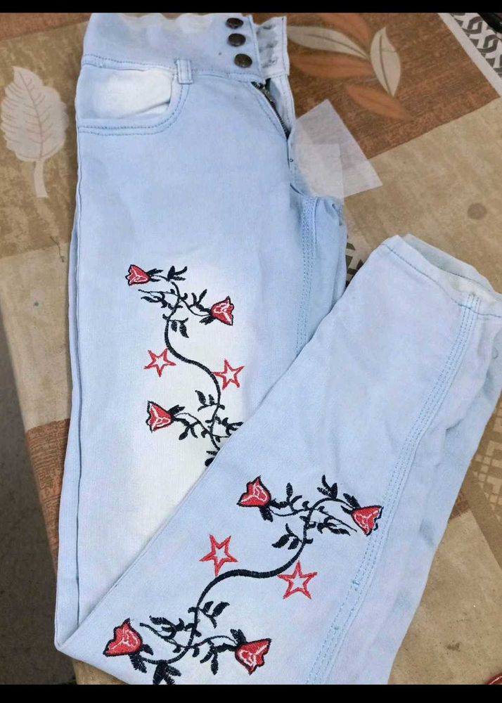 Embroidered High-Waisted Jeans