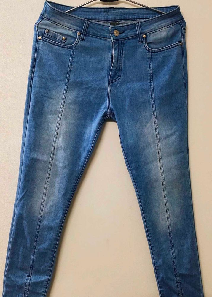 Beige Trousers And Blue Denims