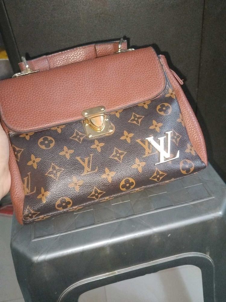 louis vuitton first copy sling bag