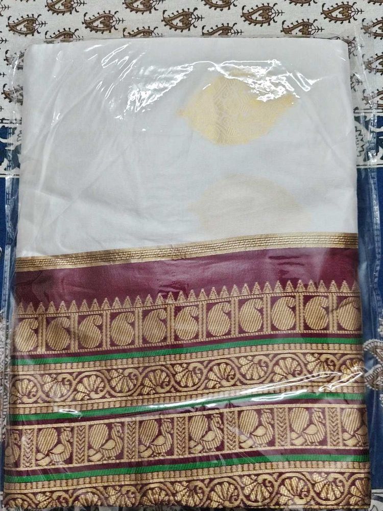 Elegant White Saree with Maroon Border