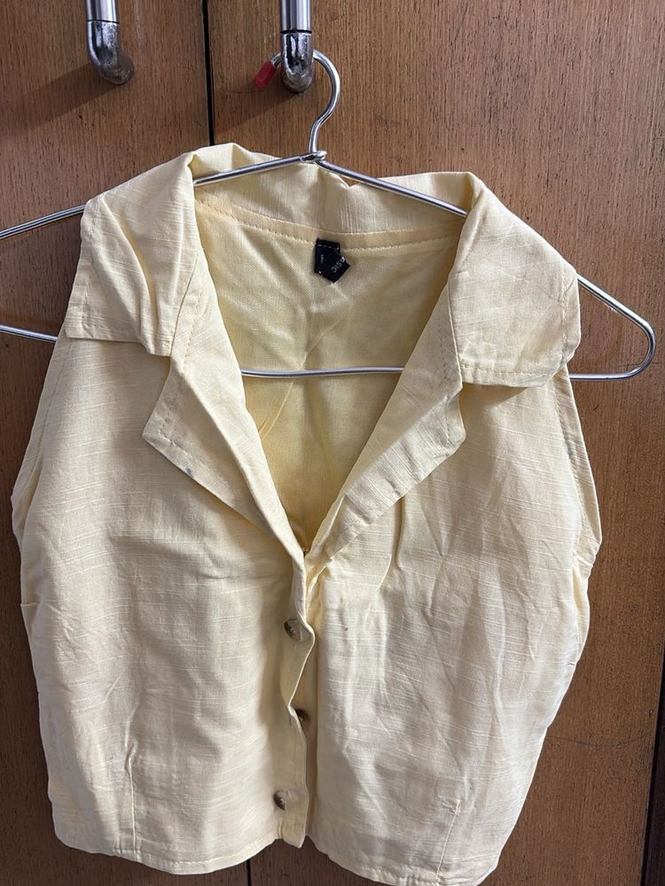 Pale Yellow Sleeveless Collared Top