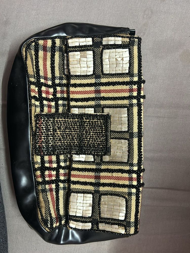 A Hand Clutch Embroidered Custom Made