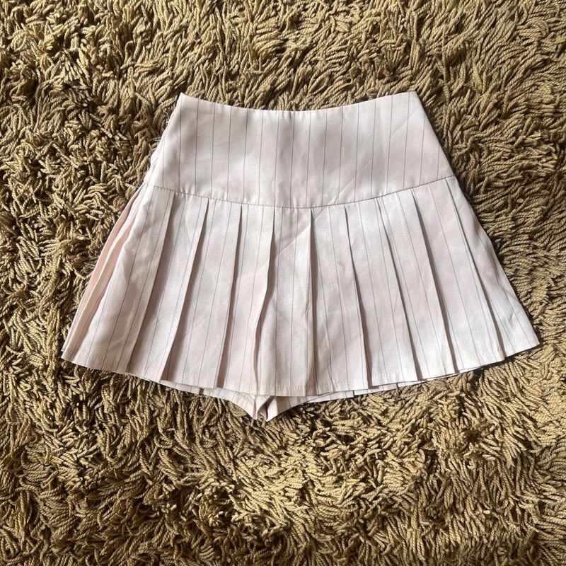 high-waisted pleated mini skirt