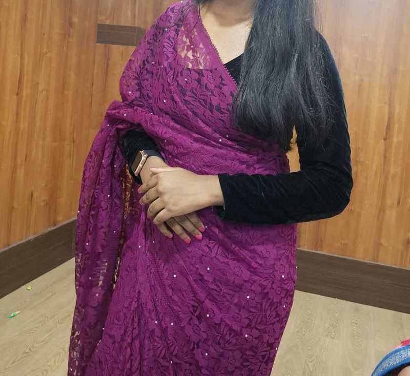wine colour net saree with black velvet blouse