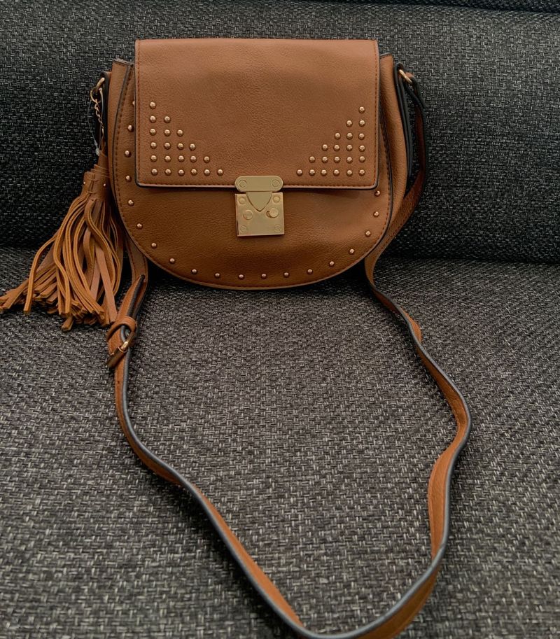 Faux leather saddle bag with stud