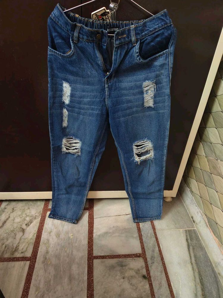 Ripped Blue Denim Jeans