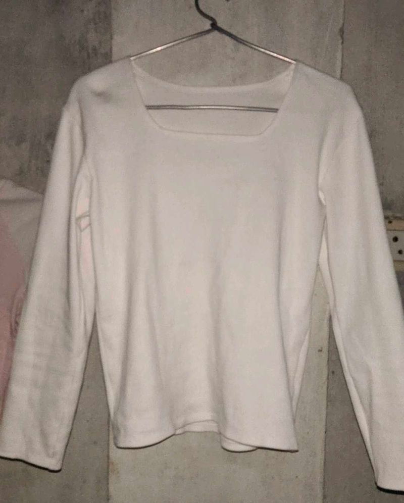 white top , square neck