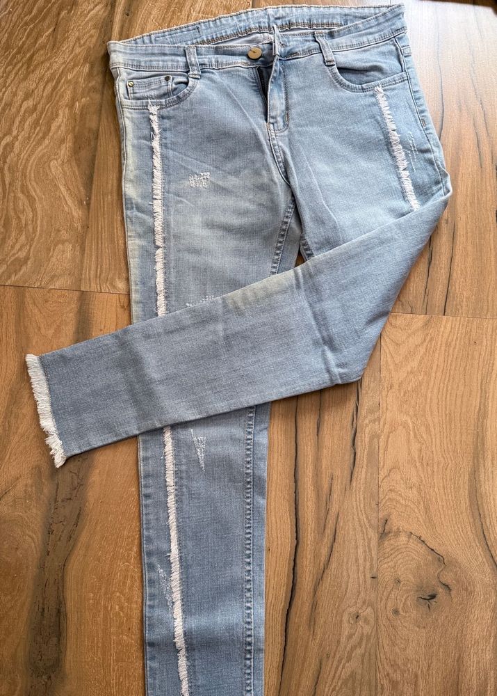 Light Wash Distressed Denim Jeans