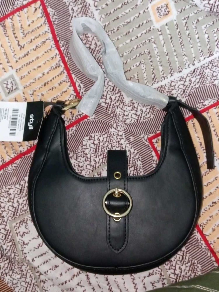 Chic Black Hobo Bag with Gold Accent