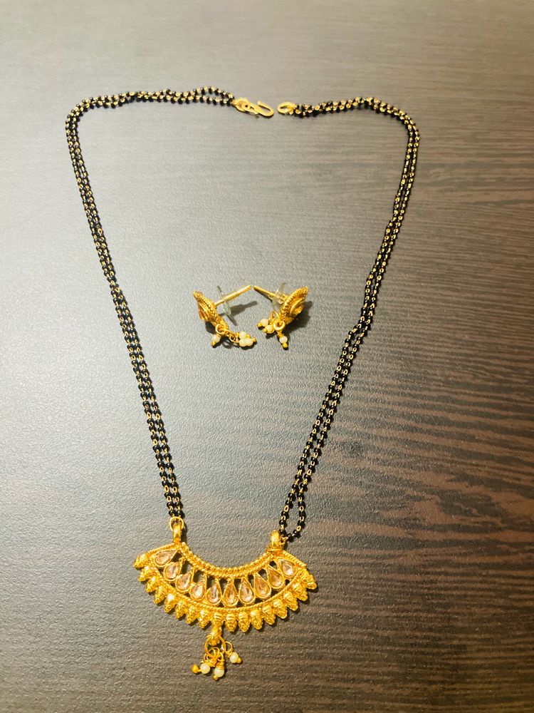Shining Golden Mangalsutra With Ear Tops Medium Length With Stones/Diamond
