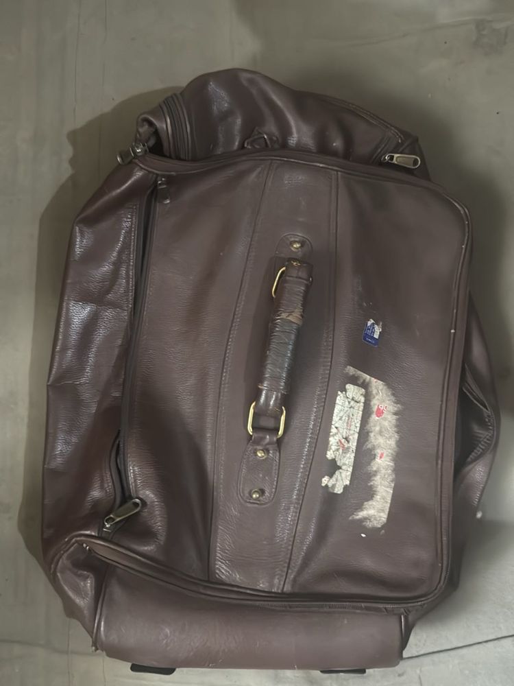 Leather Rolling Suitcase