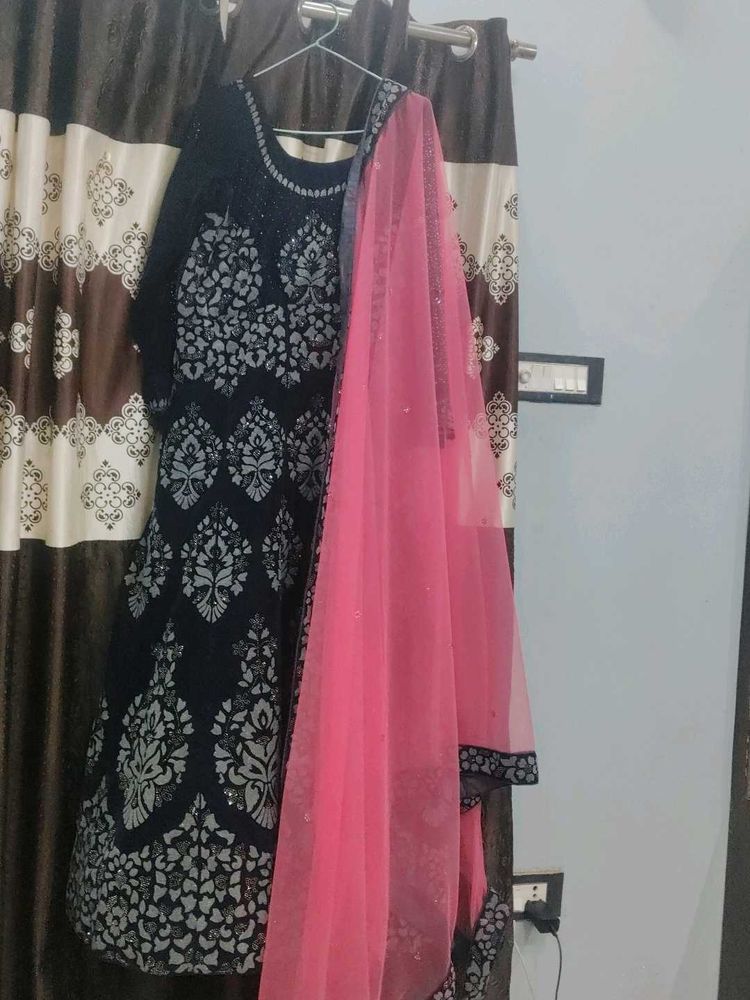Elegant designer one time used velvet gown
