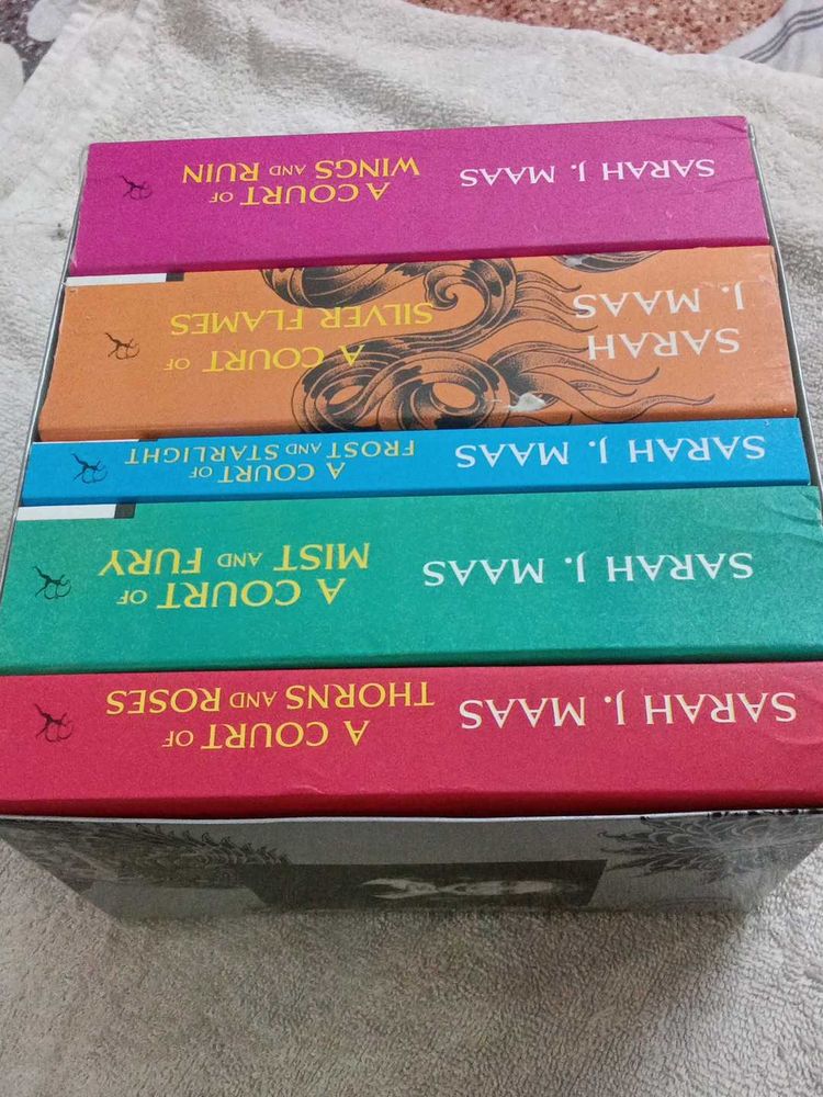 A Court of Thorns and Roses Series by Sarah J. Maa