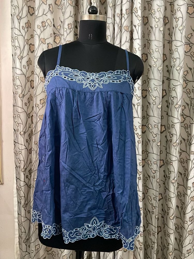 Blue Blouse with White Embroidery