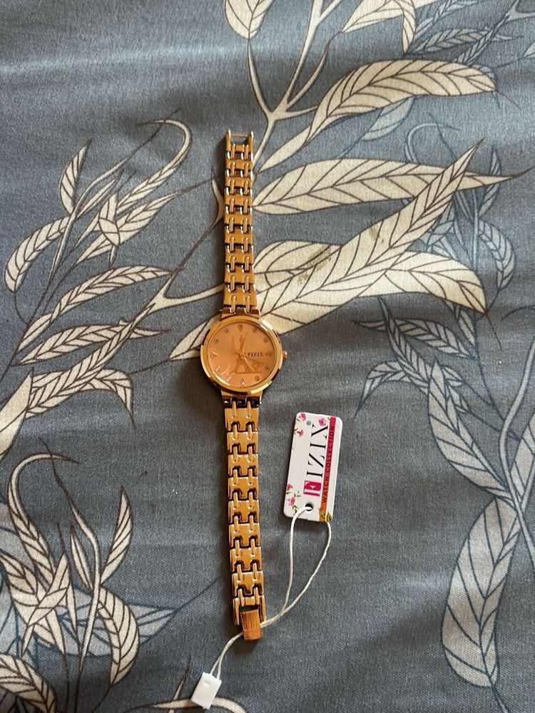 Elegant Gold Tone Eiffel Tower Watch