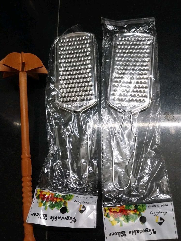 2 Stainless Steel Vegetable Slicers and ravi