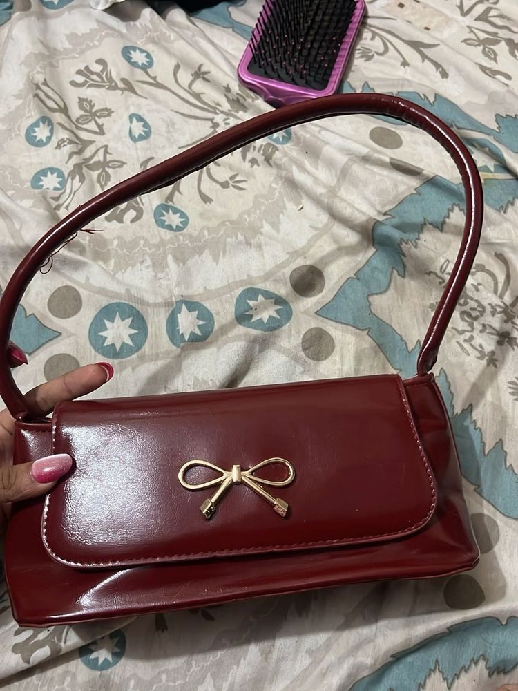 Chic Burgundy Patent Bow Clutch