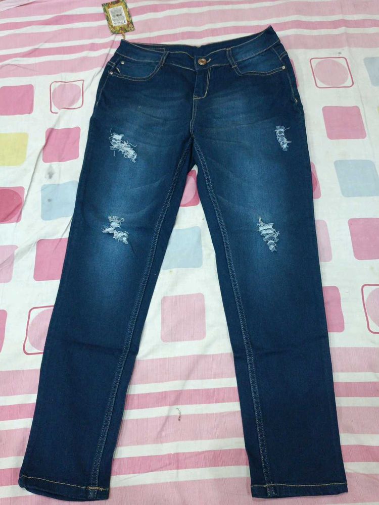 Ripped Blue Denim Jeans