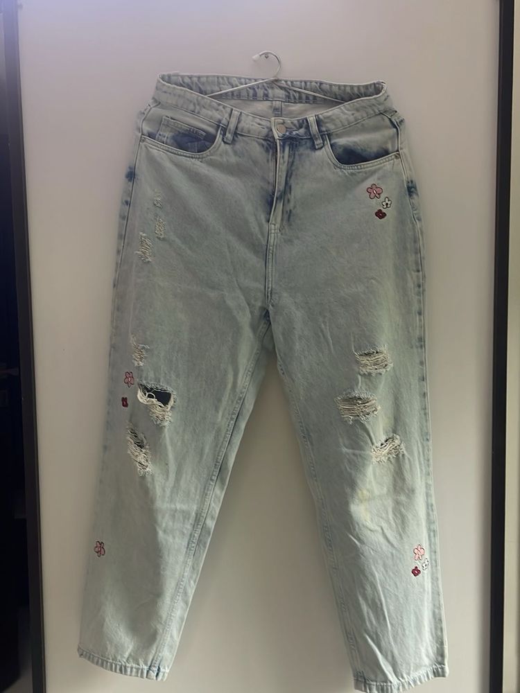 Ripped Jeans with Floral Embroidery