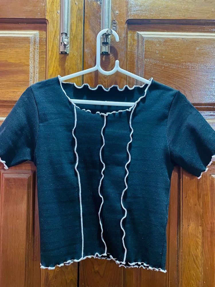 Chic Black Lettuce Hem Top