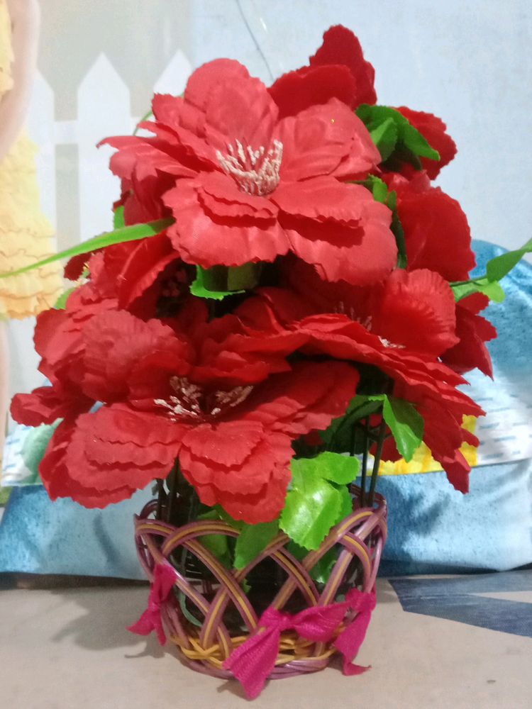 An Artificial Flower Basket For Room Decor