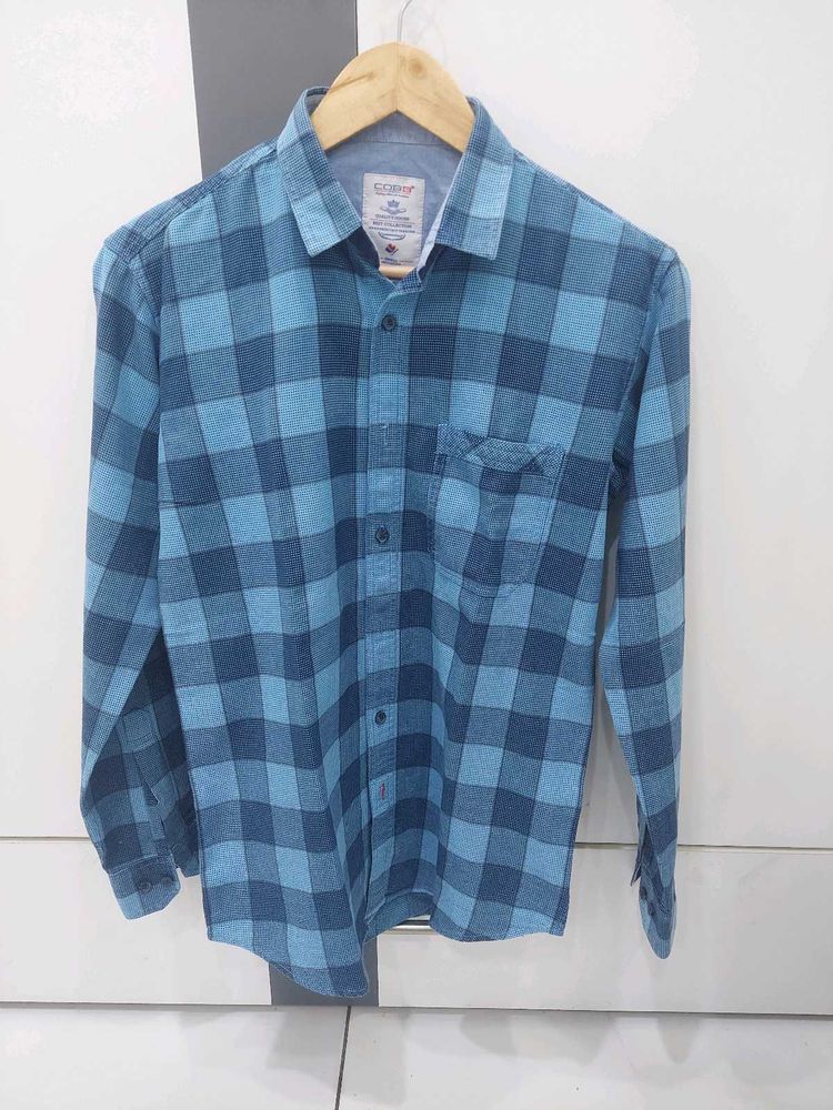 blue checkered shirt