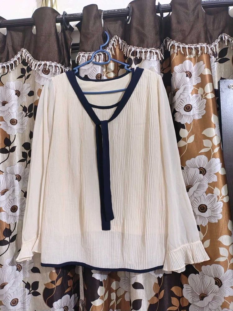 Cream Pleated Blouse with Navy Trim