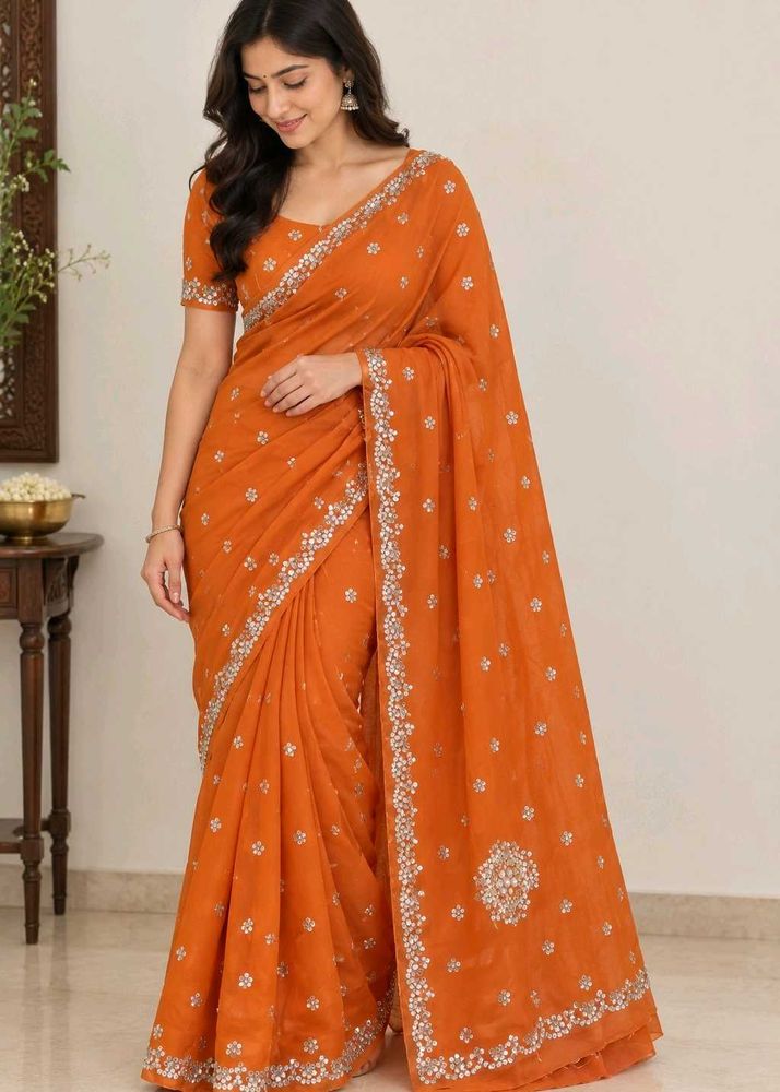 Elegant Orange Embroidered Saree
