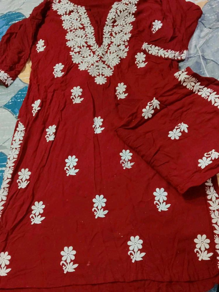Maroon elegance paired with delicate Chikankari