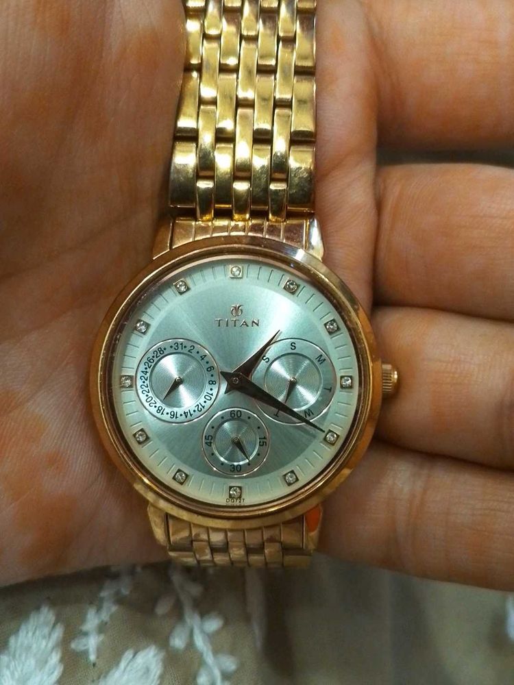 Elegant Titan Gold Watch
