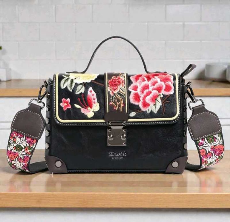 Embroidered Black Handbag with Floral Strap