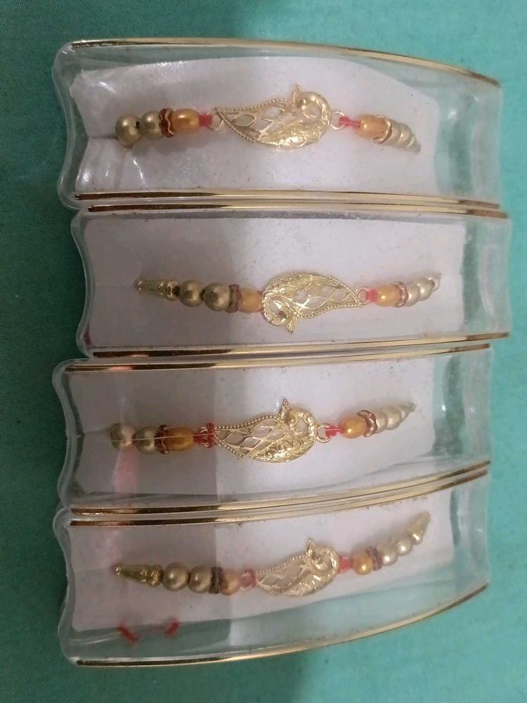 Set of 4 Elegant Gold Tone Bracelets