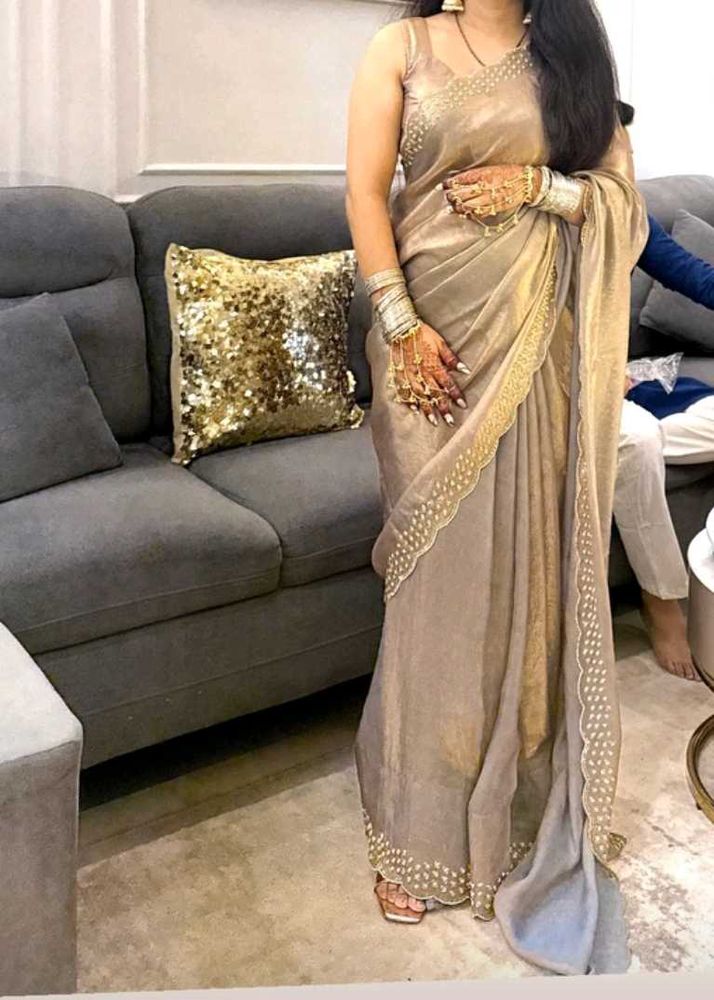 Elegant Beige Saree with Embellished Border