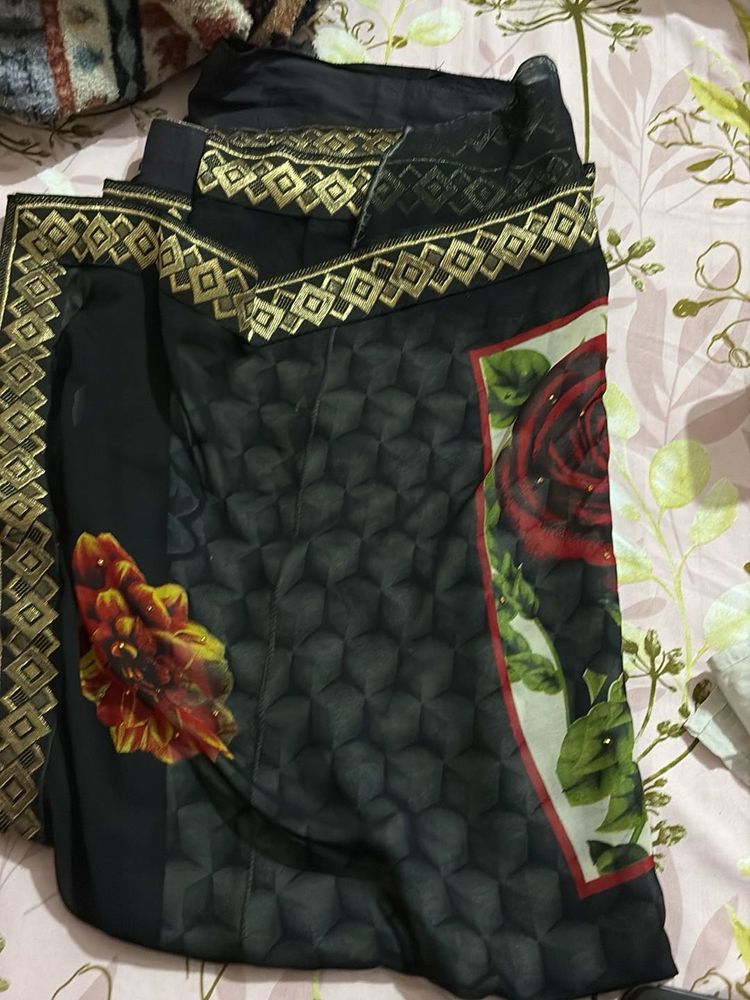 Elegant Black Saree with Gold Border