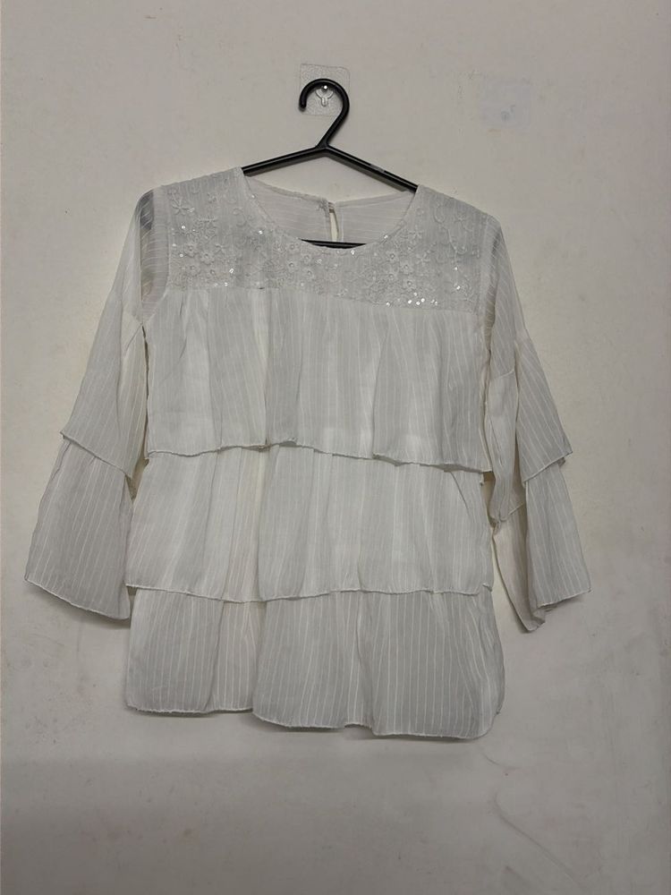 Elegant White Tiered Blouse