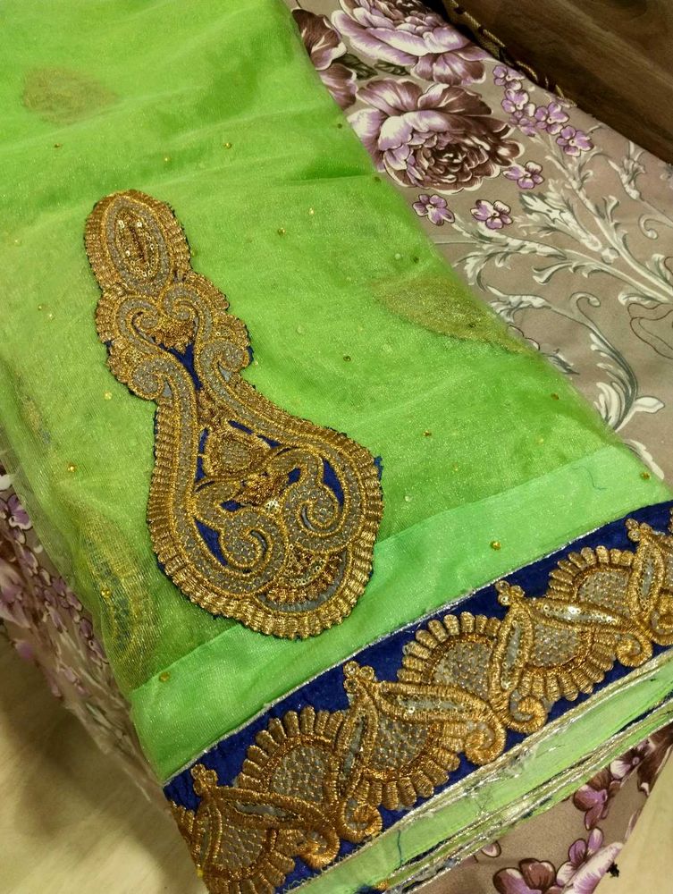 Elegant Green Saree with Embellishments