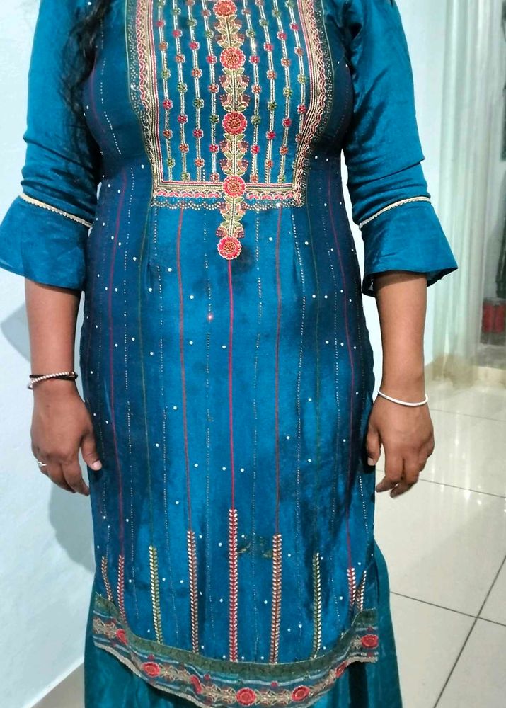 Beautiful peacock colour sharara suit