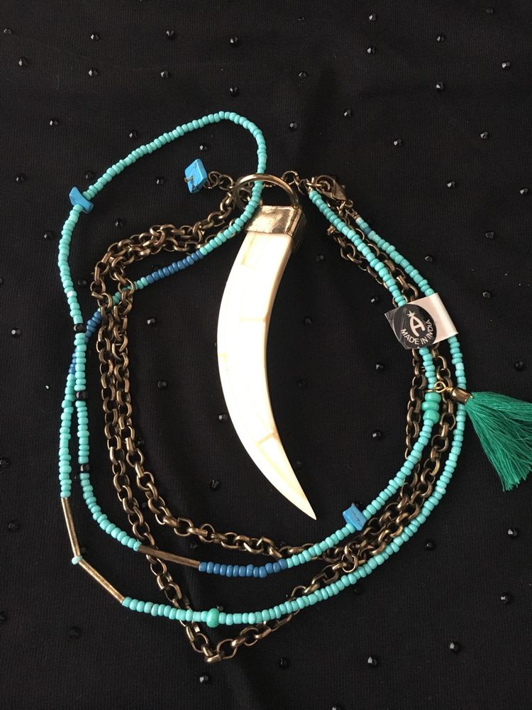 ivory tooth and Turquoise beads Necklace.