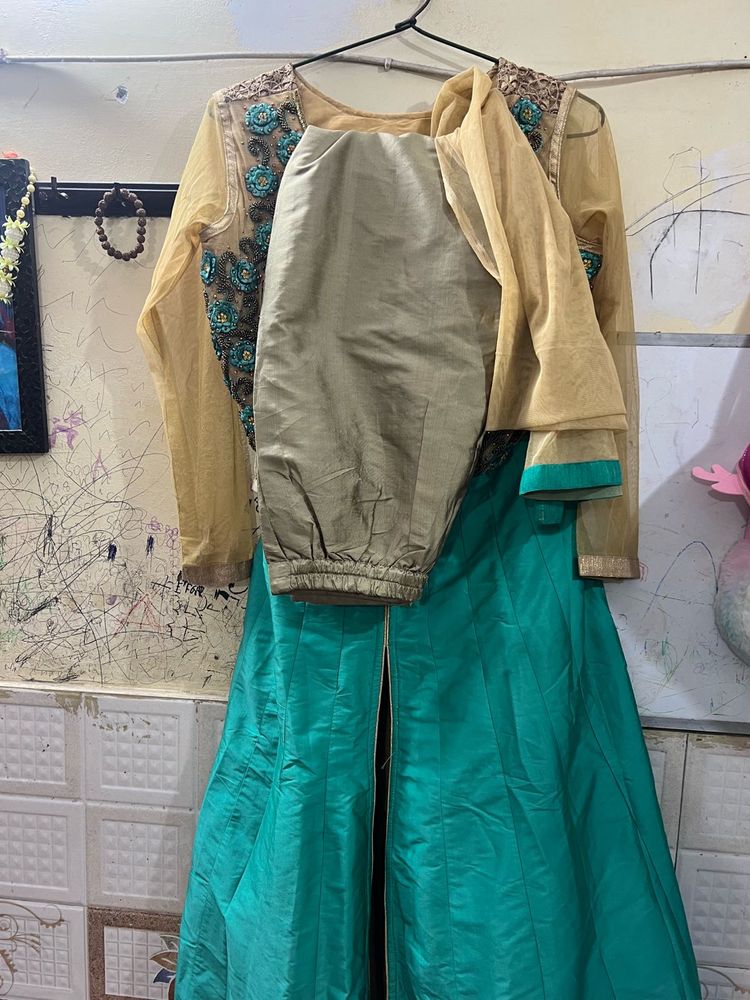 Elegant Teal Kurta Set with Embellished Top