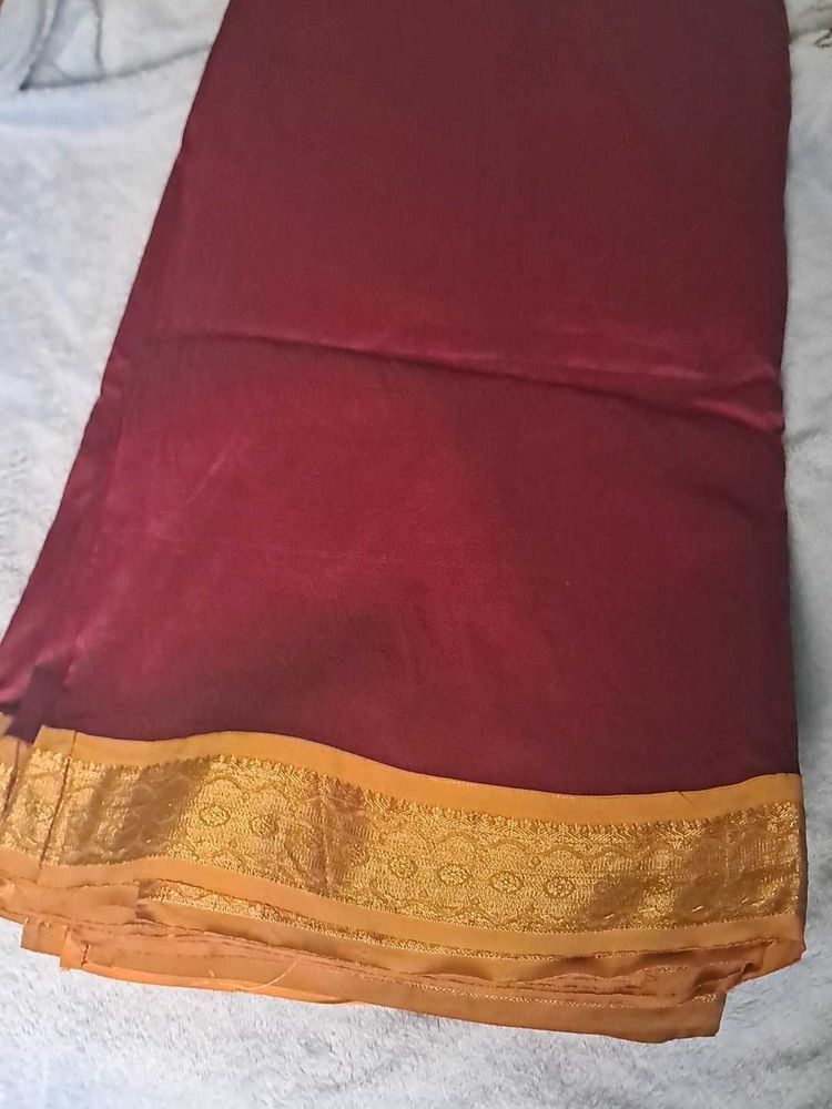 Elegant Maroon Saree with Golden Border