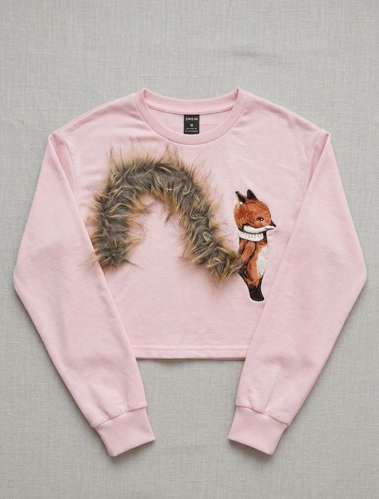 Shein pink crop sweatshirt with a wolf design