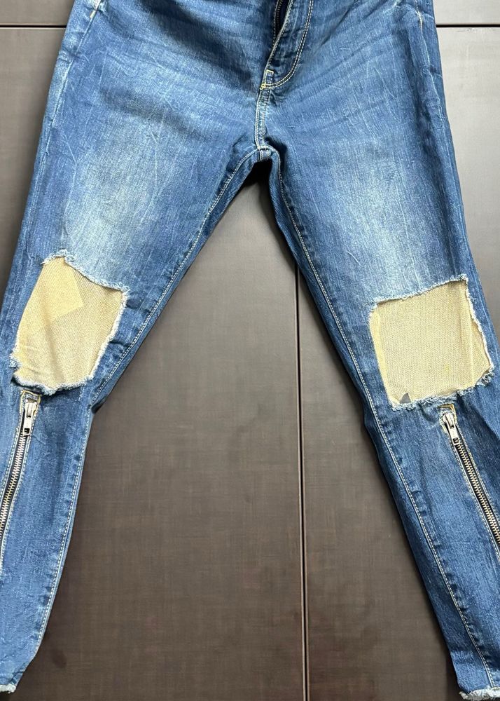 Distressed Blue Denim Jeans with Zipper Cuffs