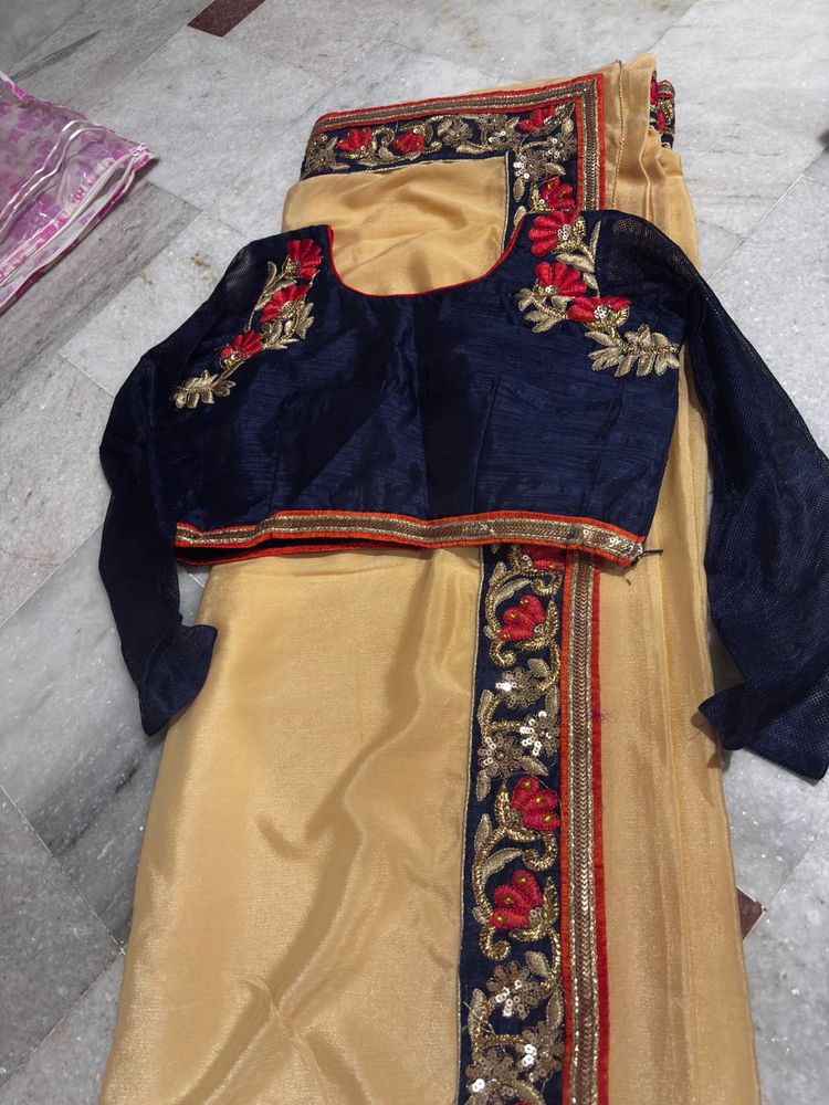 Beautiful Gold Saree with Navy Blouse