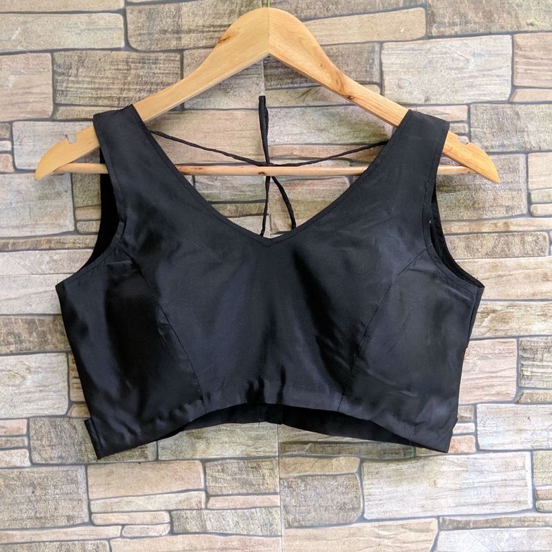 Sleek Black Sleeveless V-Neck Blouse
