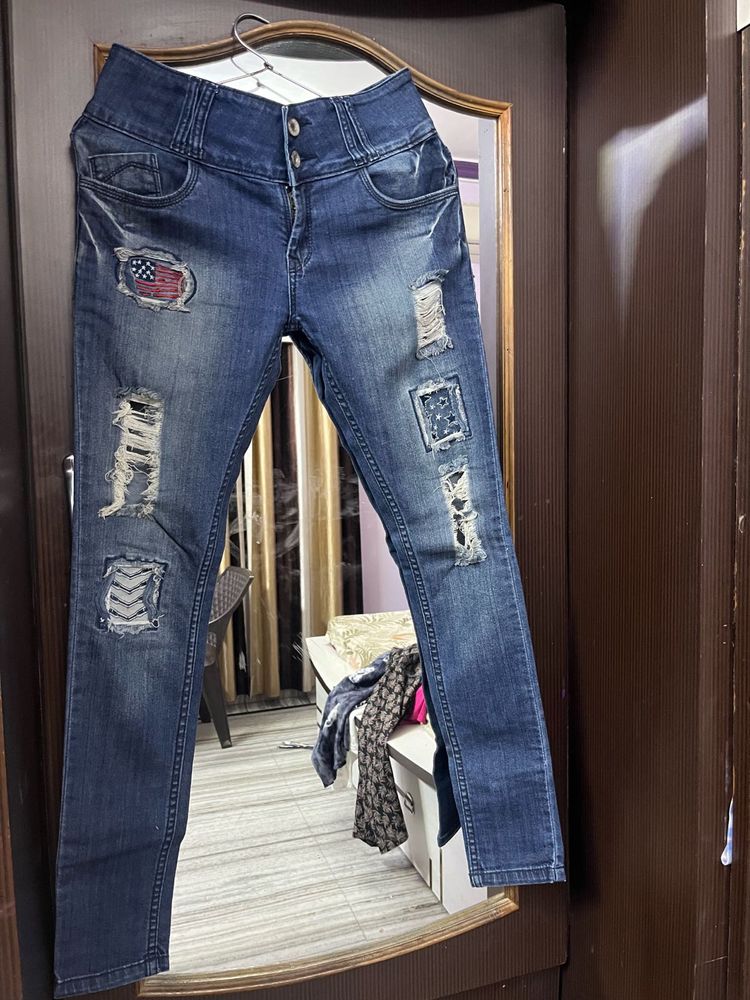 Distressed Patchwork Denim Jeans