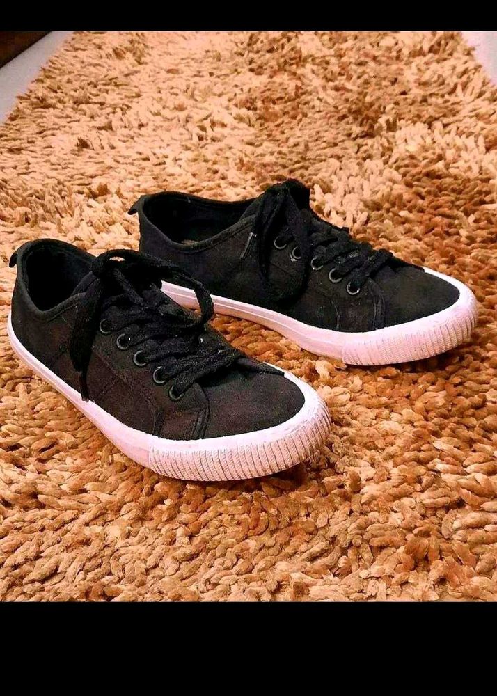 Black Canvas Sneakers available in coins