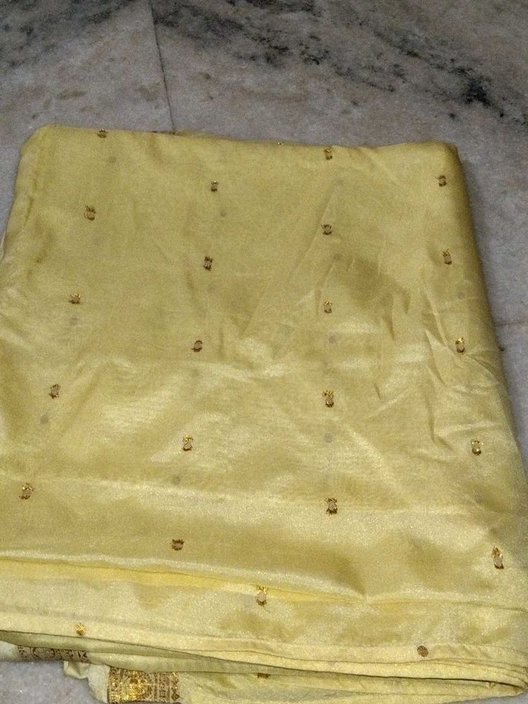 Elegant Yellow Saree with Embellishments