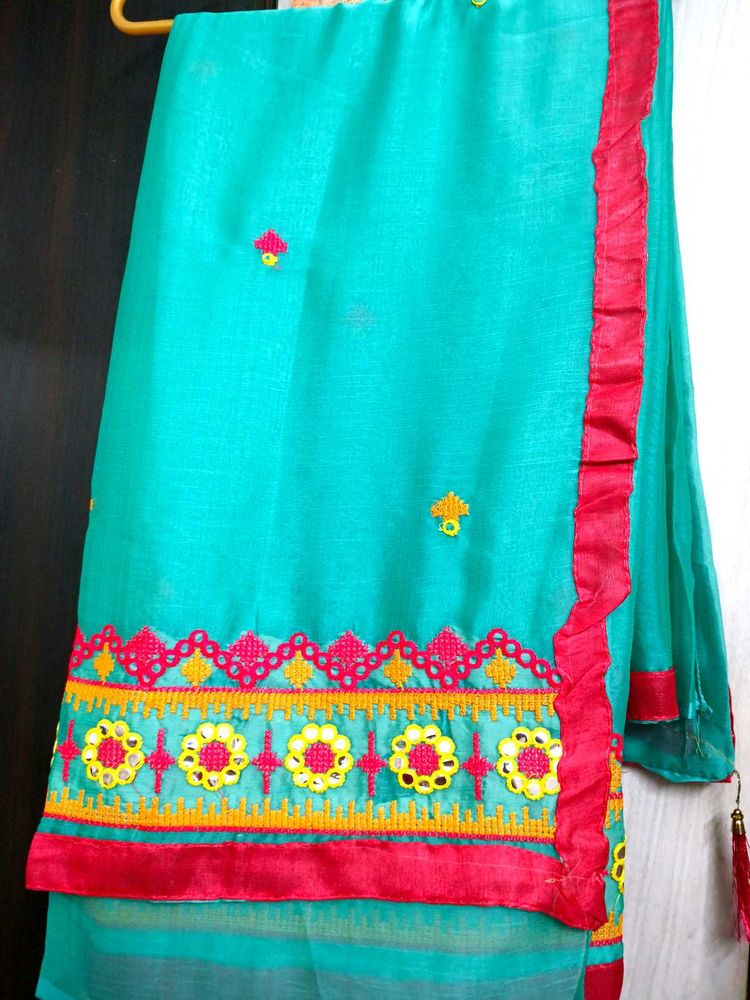 Beautiful Teal Saree with Pink Border
